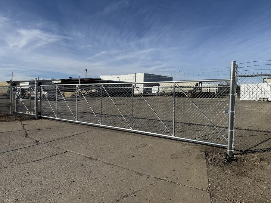 Commercial sliding chain link gate